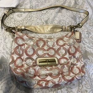 Pink signature hobo/crossbody bag